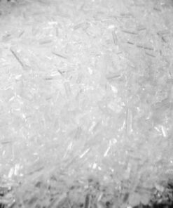 Close-up image of ketamine crystals, showcasing their clear, shard-like structure and high purity.