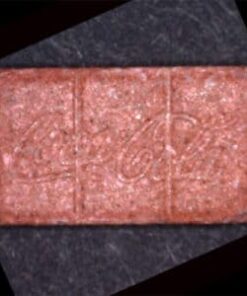 Close-up image of Coca-Cola-themed MDMA pills in vibrant colors, showcasing their unique design and smooth finish.