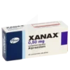 Xanax (Alprazolam) tablets, a prescription medication for anxiety and panic disorders.